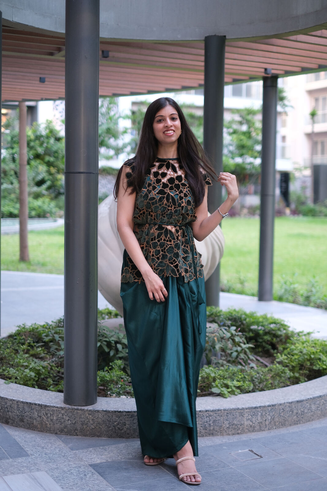 Emerald green draped skirt with floral lace top