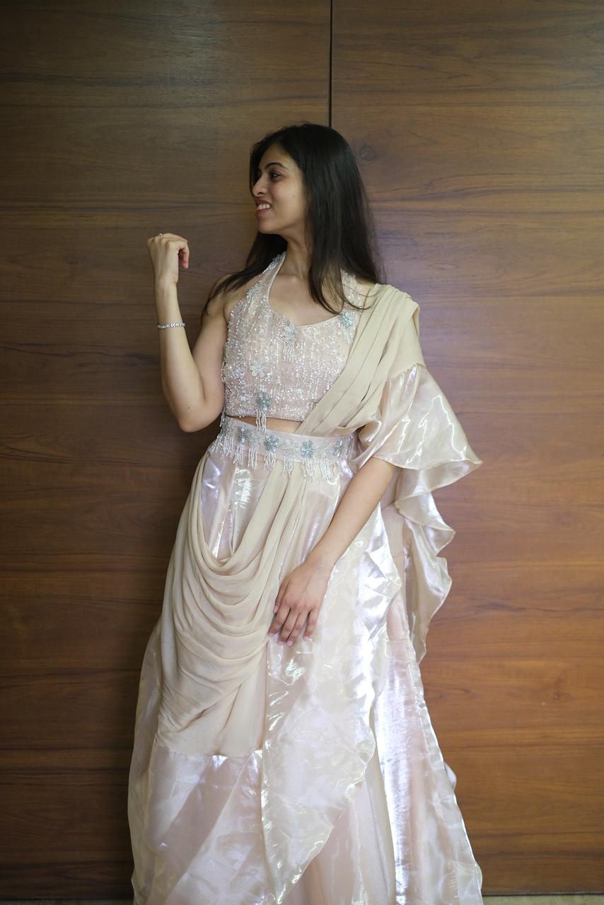 Blush shimmer halter corset with draped skirt and dupatta